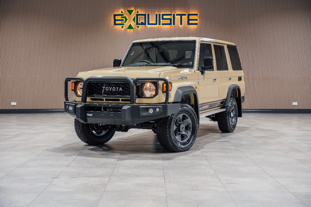 Toyota Land Cruiser 76 in sand with bull bar